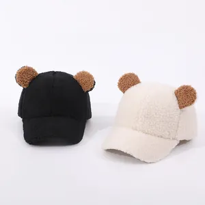 Winter fleece baseball caps for babies featuring cute brown bear ears in black and cream