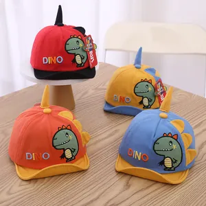Detailed embroidery of DINO text and cartoon dinosaur patch on kids cotton baseball caps