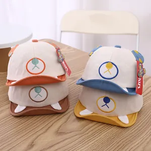 Detail of baby baseball caps with 3D bear ears and animal embroidery on soft cotton fabric