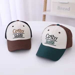Kids color-block baseball caps with Colby Clark embroidery in two stylish combinations