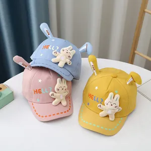 Cute baby baseball caps with 3D bunny ears in blue, pink, and yellow for infants