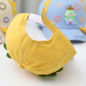 Detail of adjustable velcro strap on cartoon baby baseball cap made of cotton twill