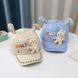 Cute baby bunny baseball cap with plush ears in beige and light blue cotton fabric