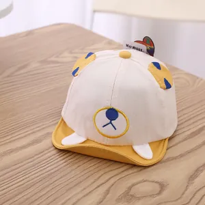 Detailed close-up of a baby bear ear baseball cap featuring colorful 3D embroidery detail