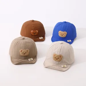 Group shot of quick-dry baby baseball caps with soft brims and cute 3D bear patches
