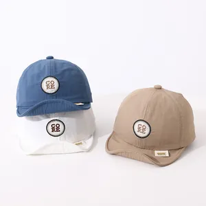 Three colors of soft-brim baby cotton baseball caps with CORE embroidered patch