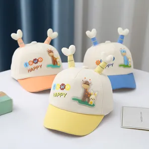 Detail of canvas baby baseball caps with cute cartoon embroidery and plush heart accents