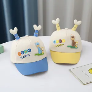 Detailed view of baby baseball cap with 3D horns and cute giraffe rabbit patches