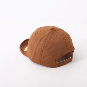 Detailed back view of a brown quick-dry baseball cap with adjustable strap for kids