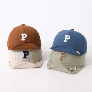 Toddler soft brim baseball caps with P embroidery in blue, brown, beige, and green