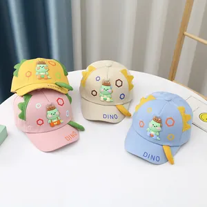 Cartoon dinosaur baby baseball caps in multiple colors with 3D fins and dino embroidery