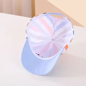 Detail view of colorful striped interior stitching and reinforced peak of kids baseball cap