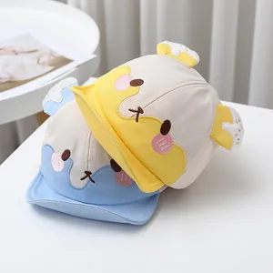 Baby-Baseballkappen aus Baumwolle mit Cartoon-Bärenohren in Gelb und Blau, 2er-Pack