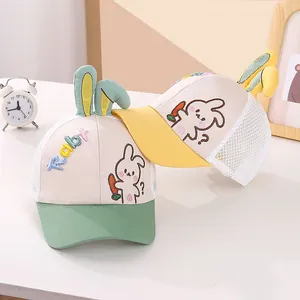 Detail of toddler mesh baseball caps with long rabbit ears and cute carrot embroidery