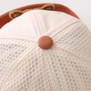 Close-up of baby mesh baseball cap showing bear ears and breathable mesh stitching