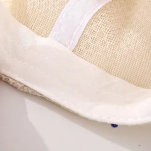 Close-up of baby mesh baseball cap interior showing breathable fabric and stitching