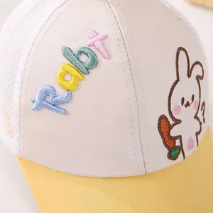 Detail of embroidered rabbit holding a carrot and breathable mesh on toddler baseball cap