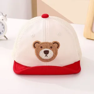 Close-up of baby baseball cap featuring mesh fabric and cute 3D bear embroidery detail