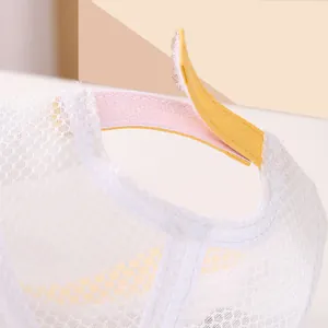 Close-up of adjustable velcro strap on breathable mesh baby sun hat with long ears