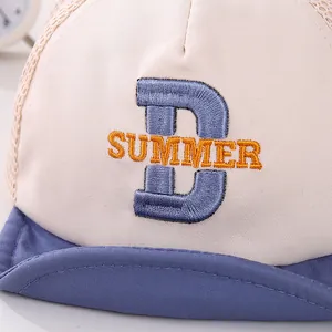 Close-up of summer mesh sun hat with 3D embroidery D and summer text details