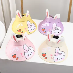 Detailed view of adjustable buckles on cartoon rabbit sun hats in four pastel colors