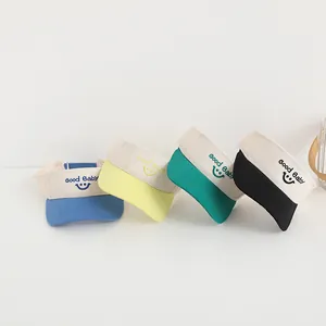 Kids smile face sun visor hats in blue yellow green and black colors for summer outdoor