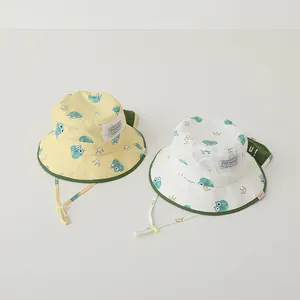 Detail of baby sun hats featuring cute frog patterns and breathable mesh panels