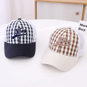 Detailed view of plaid mesh trucker hats with 3D Frog embroidery and breathable design
