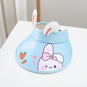 Close-up of light blue baby sun hat with cute rabbit ears and bow-knot detail