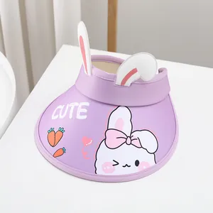 Detail of light purple sun hat with 3D bunny ears and cute carrot patterns for kids
