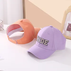 Kids open top baseball cap with KUDE embroidery for high ponytails in purple and orange