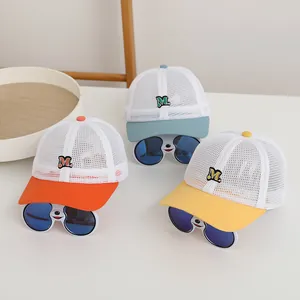 Breathable mesh baseball caps for kids with letter M embroidery in orange, blue and yellow