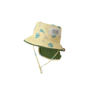 Kids yellow sun hat with cartoon dinosaur prints and neck protection flap for summer