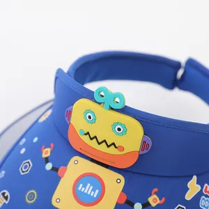 Detailed close-up of a blue kids sun hat featuring a 3D robot and gear patterns