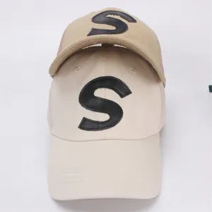 Kid's trucker hat with S letter patch, breathable mesh and curved brim in beige and khaki