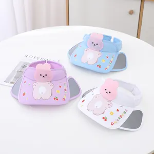 Close-up of kids sun visor hats with cute bunny patterns and retractable side shields