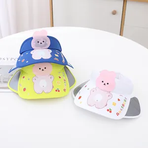 Detail view of colorful kids sun visors with cartoon rabbit ears and retractable side panels