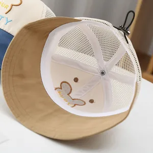 Detail view of breathable mesh lining and adjustable drawstring on kids' sun hat