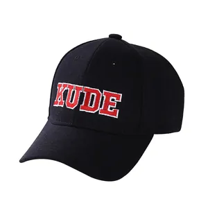 Black baseball cap for kids with red KUDE letter embroidery and curved brim visor