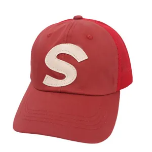Red mesh baseball cap for kids with white letter S embroidery and curved brim