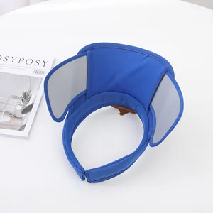 Detail of blue children sun visor hat with retractable gray lenses and mesh fabric