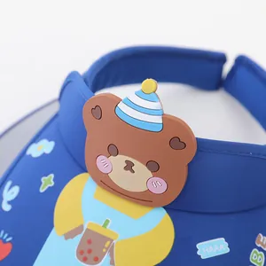 Close-up of kids navy sun visor featuring 3D cartoon bear and cloud patterns