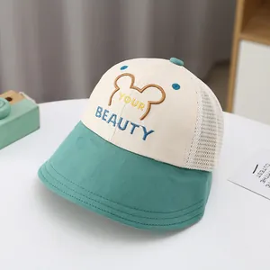 Detailed embroidery on kids mesh sun hat with bear patch and breathable fabric