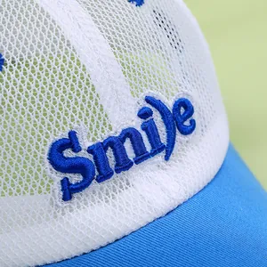 Kids breathable mesh baseball cap featuring blue Smile embroidery and contrast colors