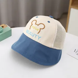 Detailed close-up of breathable mesh back and bear embroidery on kids sun bucket hat