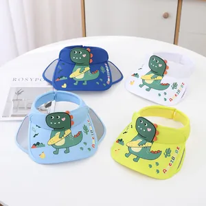 Detail of colorful kids' visor hats with 3D dinosaur cartoon graphics and breathable mesh
