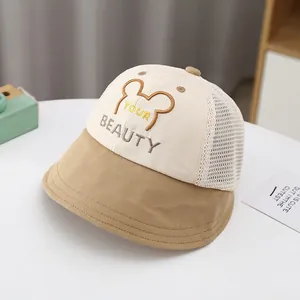 Close-up of kids sun hat featuring breathable mesh, bear ear design and embroidery