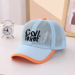 Detail of breathable mesh kids baseball cap with blue body, orange brim and Col embroidery