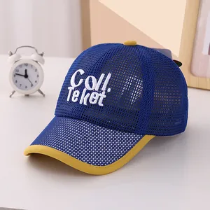 Detail of blue and yellow mesh baby baseball cap with white Coll embroidery and breathable fabric