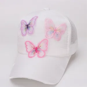 Detailed embroidery of colorful butterfly accents on breathable mesh baseball cap